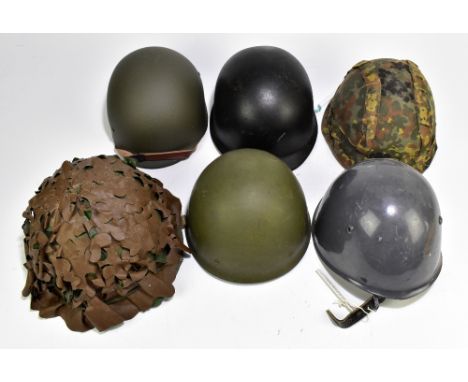 Five military and public service helmets comprising German Army M62 1A1, Italian Serbian Police, Swedish Army M37-62, French 