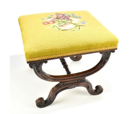 A William IV rosewood foot stool, raised on X-stretcher, with tapestry seat,&nbsp;height 40cm.Additional InformationNumerous 