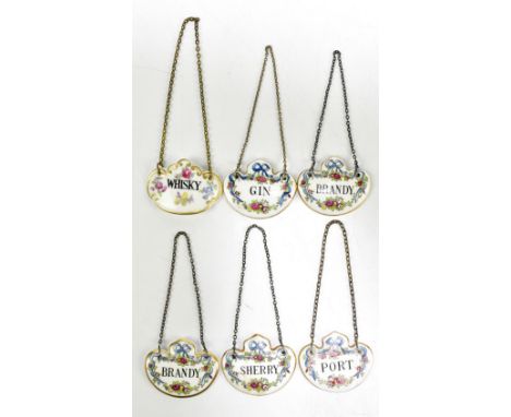 CROWN STAFFORDSHIRE; four hand painted ceramic decanter labels, together with similar Coalport and Hammersley &amp; Co exampl