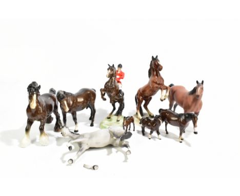 BESWICK; a model of a huntsman on rearing mount,&nbsp;height 23cm, also eight horses (9).Additional InformationGeneral wear t