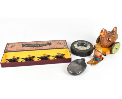 A mixed lot of assorted collectors' items including a British-made tinplate pull-along chicken, a further tinplate model of a