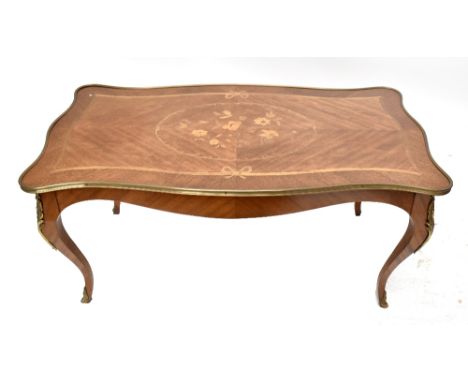 EPSTEIN; a reproduction French-style walnut and inlaid coffee table of serpentine outline raised on cabriole legs with gilt m