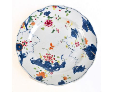 An 18th century Chinese porcelain unfinished Tobacco Leaf pattern plate with enamelled detail and shaped rim, unmarked, diame