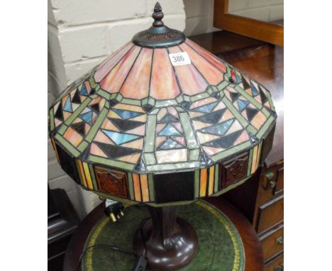 A Tiffany style table lamp with decorative shade 