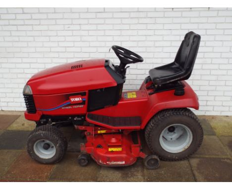 Toro wheel horse ride-on motor lawn mower, with 20 HP Kohler engine, fitted 48" motion cutting deck