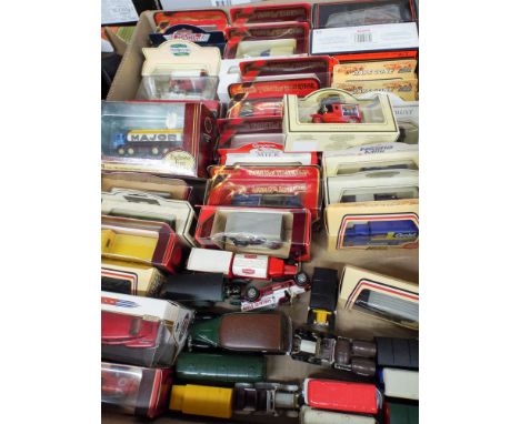 Approximately 31 boxed models of yesteryear, days gone by Dinky and other model cars and approx 15 unboxed cars coaches etc 