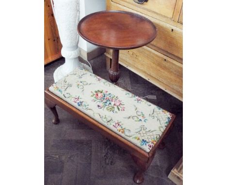 A long footstool on cabriole legs and a mahogany wine table