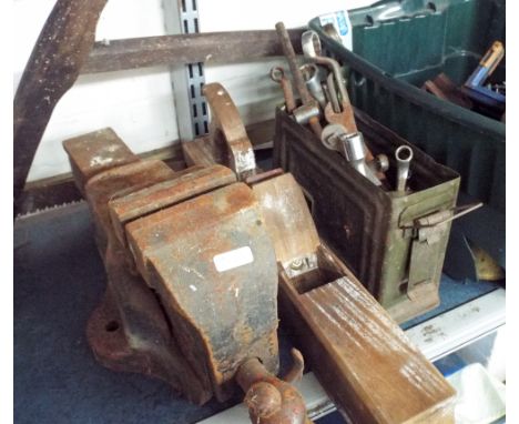 A large quantity of old hand tools and an old bench vice saw etc 