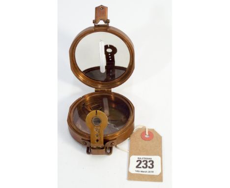 A Clinometer brass compass