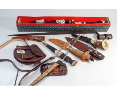 Various sheath knives, Scottish dirks, beret, scarf, bayonet etc.