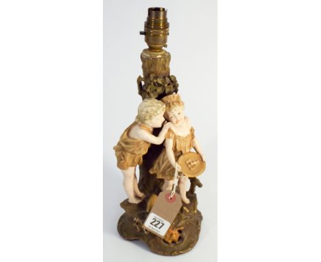 Royal Dux figure candlestick converted to electricity approx 12" tall  A few chips in places to the flower leaves on the base