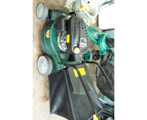 A 98.5cc petrol engine self propelled lawn mover 