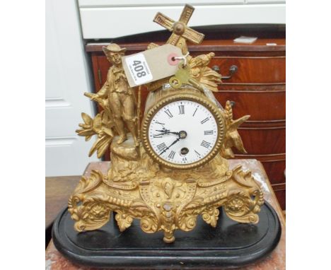 A French gilt figure mounted mantle clock 