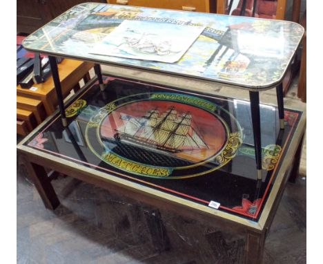 A brass framed picture top coffee table and a 1960's coffee table with picture top 