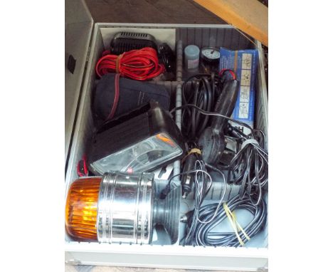 Two aluminium carry cases containing speakers, walkie talkie, 12 volt spotlight, 12 volt flashing orange light etc 