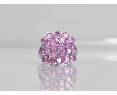 A 9ct Gold and Pink Sapphire Cluster Ring, 22 Round Cut Stones Supported in White Metal Claws, Split Shoulders to a Square Sh