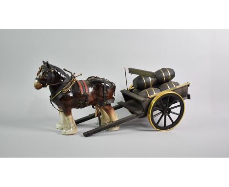 A Ceramic Heavy Horse with Brewers Drey