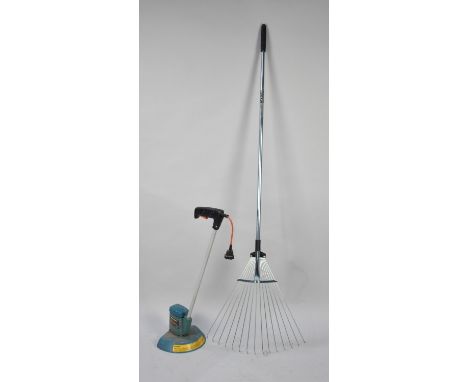 A Modern Wilkinson Folding Garden Rake and an Electric Strimmer