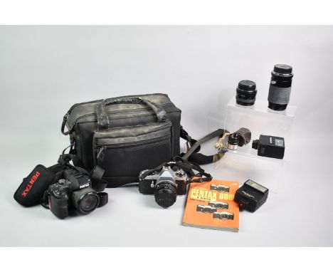 A Camera Bag Containing Pentax Super 35mm Camera together with Two Lenses, Flash Guns and Pentax Book together with a Pentax 