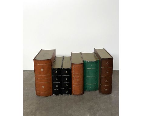 Interior decoration with leatherbound book design that could also be used as a saloon/coffee table. This item is hollow and o