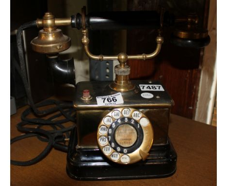 Vintage 1900s Danish Kjobenhavns desk telephone with rotary dial and body in brass with bakelite handle
