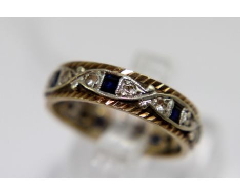 9ct yellow and white gold black stone set eternity ring