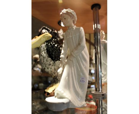 Nao girl in nightdress figurine 20cms high