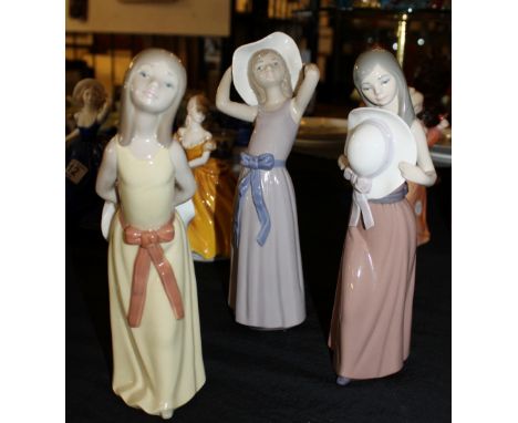Three Lladro figurines of girls
