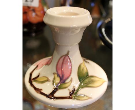 Moorcroft Magnolia pattern candlestick on cream ground, H ~ 8cm