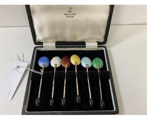 A set of six coffee bean spoons with enamel backs, marked England, in Walker and Hall box, ( 9.5cm)