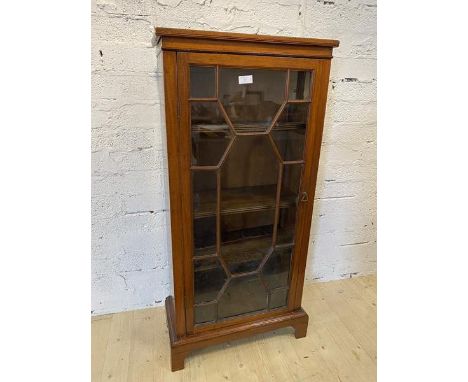 A late 19th early 20thc mahogany bookcase, the rectangular top over glazed door, before three adjustable shelves, on bracket 