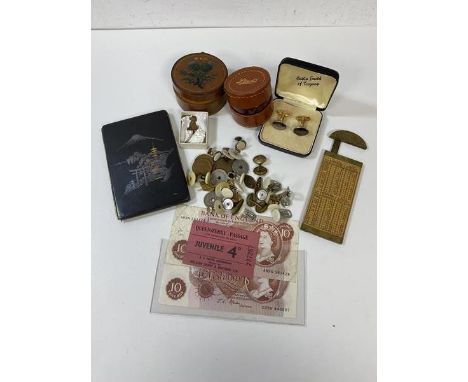 A mixed lot including sleeve links, studs, ten shilling note, juvenile Queensferry passage ticket, cable calipers, and a Japa