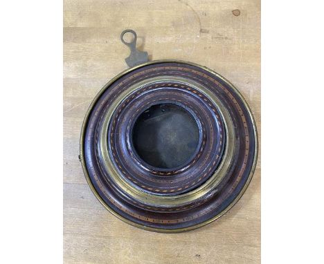 A late 18th early 19thc circular barometer frame with inlaid detail and brass rings, come losses, (16cm diameter)