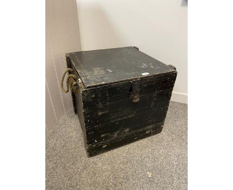 A mid 20thc crate painted black with rope handles to sides, interior with broad arrow and inscribed CWC Ltd, 1954, (49cm x 54