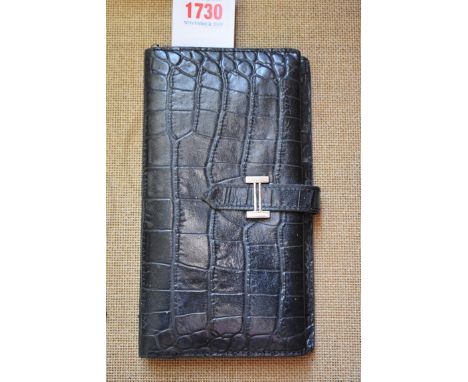A Hermes Bearn bi-fold black alligator wallet,&nbsp;19cm wide. 