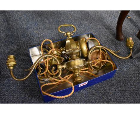 A vintage brass twin branch rise and fall counterweighted hanging light.&nbsp; 