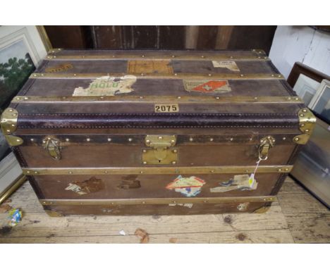 A vintage Malles Moynat canvas trunk, label to interior, 49cm high x 86cm wide x 47cm deep.&nbsp; 