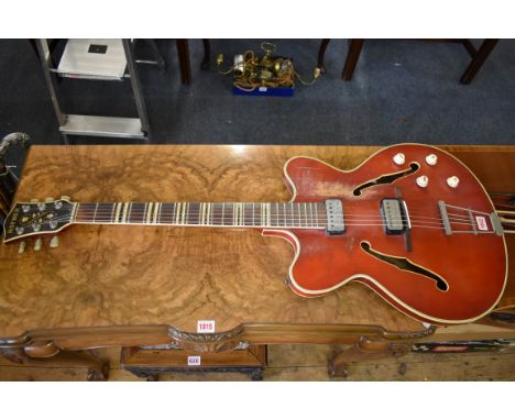 A Hofner Verithin Bigsby electric guitar. 