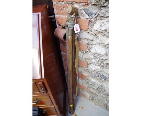 A World War II period oak and brass tripod,&nbsp;with broad arrow stamp. 