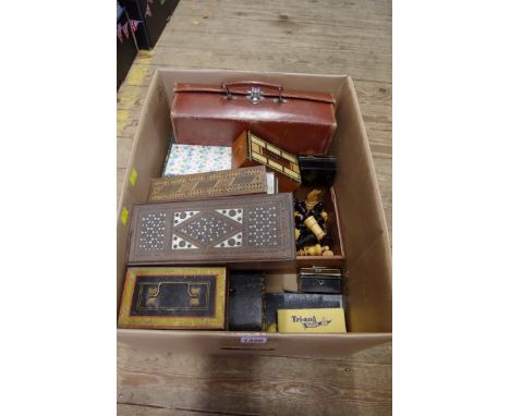 A collection of pastimes, boxes and related, to include a chess set. 
