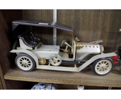 A Mamod TE1 traction engine; together with a Mamod SA1L limousine. 