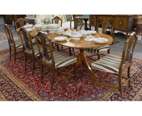 A Set of Eight Mahogany Sheild Back Dining Chairs, together with a crossbanded and inlaid Regency style twin pillar dining ta