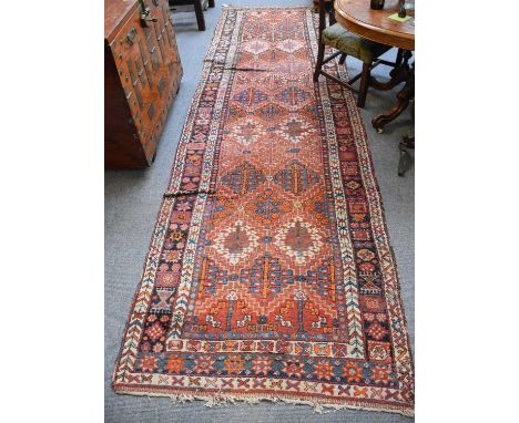 North West Persian Runner, the stepped lattice field of stylised plants enclosed by charcoal borders of geometric motifs, fla