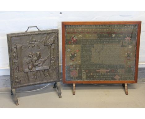 FIRE SCREENS - a Victorian sampler by Margaret Jane Barber, dated 1874, framed in an old wood firescreen with glass (72x61cm)