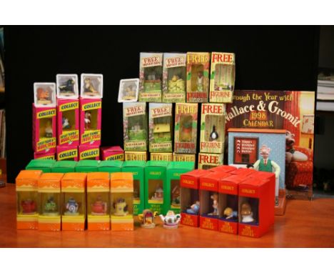 TETLEY & TYPHOO TEA COLLECTABLES - a range of Tetley and Typhoo boxed collectable figurines to include full sets of Tetley Te