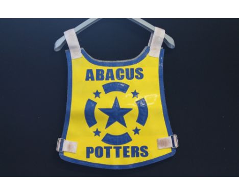 SPEEDWAY - a Speedway race jacket for the Stoke Abacus Potters, late 1980’s marked No. 4 in yellow and blue.