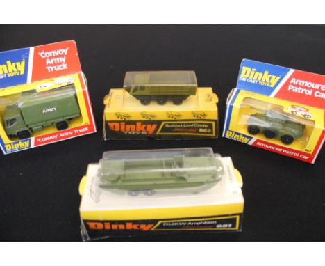 DINKY - 7 boxed Dinky vehicles to include a D.U.K.W. Amphibian, a Ferret armoured car, an armoured patrol car, a convoy army 