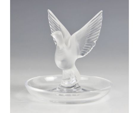 A Lalique glass trinket dish, with central frosted glass dove with open wings, engraved "Lalique France" to base, 9.5cm high 