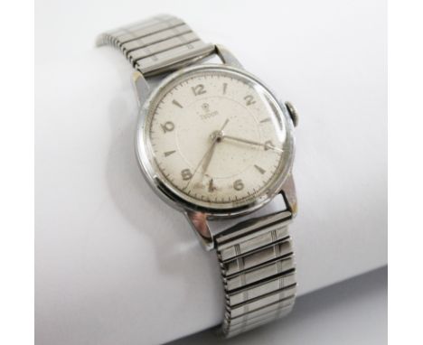 A gentleman's vintage Tudor steel wristwatch, the circular white dial with engine turned detail, Arabic and baton markers, se