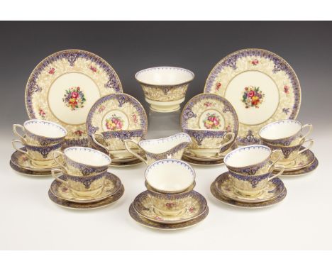 A Royal Worcester part tea service, mid 20th century, pattern number Z277, comprising; twelve teacups, twelve saucers, twelve